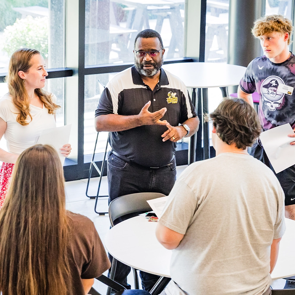 Professor and students in BW's computer science program.